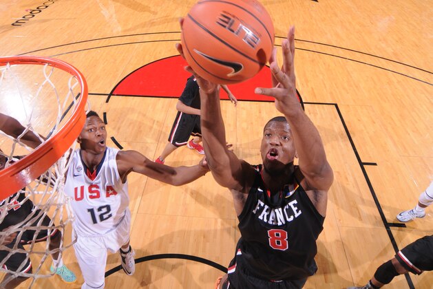 PORTLAND, OR - APRIL 12:  Damien Inglis #8 of the World Team drives to the basket against Team USA on April 12, 2014 at the Moda Center Arena in Portland, Oregon. NOTE TO USER: User expressly acknowledges and agrees that, by downloading and or using this photograph, user is consenting to the terms and conditions of the Getty Images License Agreement. Mandatory Copyright Notice: Copyright 2014 NBAE (Photo by Sam Forencich/NBAE via Getty Images)