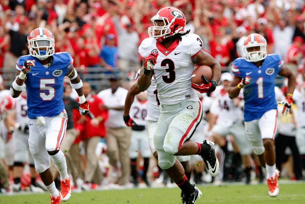 JACKSONVILLE, FL - NOVEMBER 02:  Todd Gurley #3 of the Georgia Bulldogs runs for yardage during the game against the Florida Gators at EverBank Field on November 2, 2013 in Jacksonville, Florida.  (Photo by Sam Greenwood/Getty Images)