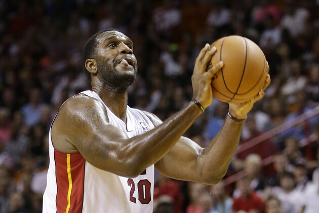 Miami Heat center Greg Oden shoots a free throw during the first half of an NBA basketball game against the Portland Trail Blazers, Monday, March 24, 2014 in Miami. (AP Photo/Wilfredo Lee)
