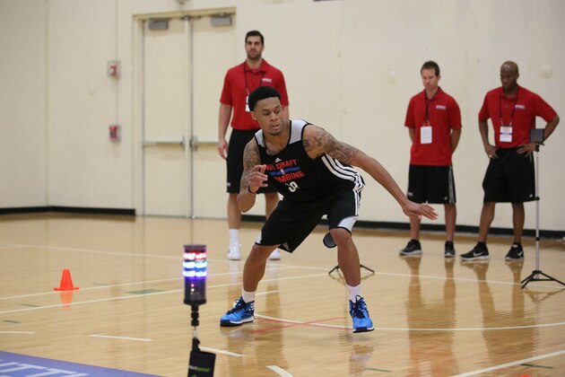 CHICAGO, IL - May 16:   K.J. McDaniels participates in drills during the 2014 Draft Combine on May 16, 2014 at Quest Multisport in Chicago, Illinois. NOTE TO USER:  User expressly acknowledges and agrees that, by downloading and or using this Photograph, user is consenting to the terms and conditions of the Getty Images License Agreement.  Mandatory Copyright Notice:  Copyright 2014 NBAE (Photo by Gary Dineen/NBAE via Getty Images)