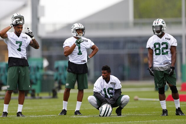 FLORHAM PARK, NJ - MAY 16: Wide Receivers Lavasier Tuinei #7,Jermaine Jones #1, Jalen Saunders #16 and Quincy Enunwa #82 of the New York Jets look on during the first day of rookie minicamp on May 16, 2014 in Florham Park, New Jersey. (Photo by Rich Schultz /Getty Images)