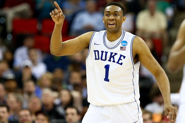 RALEIGH, NC - MARCH 21:  Jabari Parker #1 of the Duke Blue Devils reacts in the second half against the Mercer Bears in the second round of the 2014 NCAA Men's Basketball Tournament at PNC Arena on March 21, 2014 in Raleigh, North Carolina.  (Photo by Streeter Lecka/Getty Images)