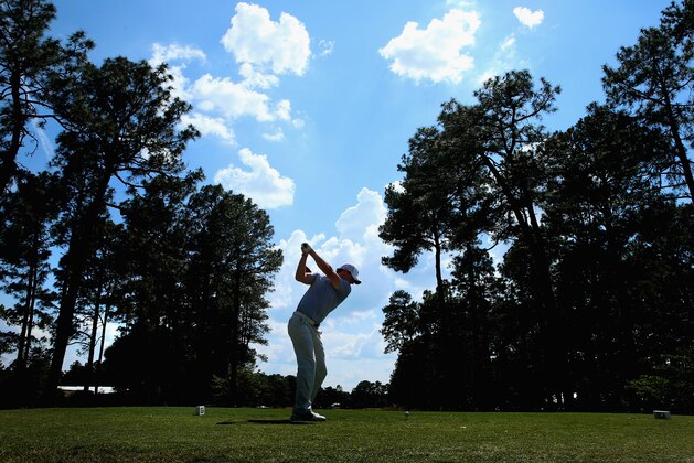PINEHURST, NC - JUNE 11:  Rory McIlroy of Northern Ireland hits a tee shot during a practice round prior to the start of the 114th U.S. Open at Pinehurst Resort & Country Club, Course No. 2 on June 11, 2014 in Pinehurst, North Carolina.  (Photo by Andrew Redington/Getty Images)