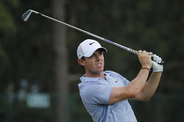 Rory McIlroy, of Northern Ireland, watches his tee shot on the 13th hole during a practice round for the U.S. Open golf tournament in Pinehurst, N.C., Wednesday, June 11, 2014. The tournament starts Thursday. (AP Photo/Matt York)