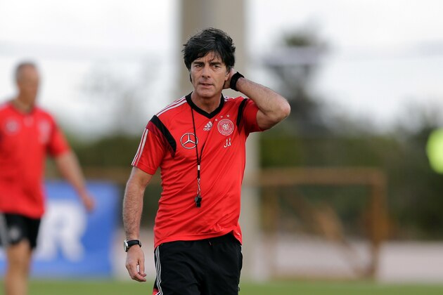 German head coach Joachim Loew watches his team during a training session in Santo Andre near Porto Seguro, Brazil, Tuesday, June 10, 2014. Germany will play in group G of the 2014 soccer World Cup. (AP Photo/Matthias Schrader) German head coach Joachim Loew watches his team during a training session in Santo Andre near Porto Seguro, Brazil, Tuesday, June 10, 2014. Germany will play in group G of the 2014 soccer World Cup. (AP Photo/Matthias Schrader)