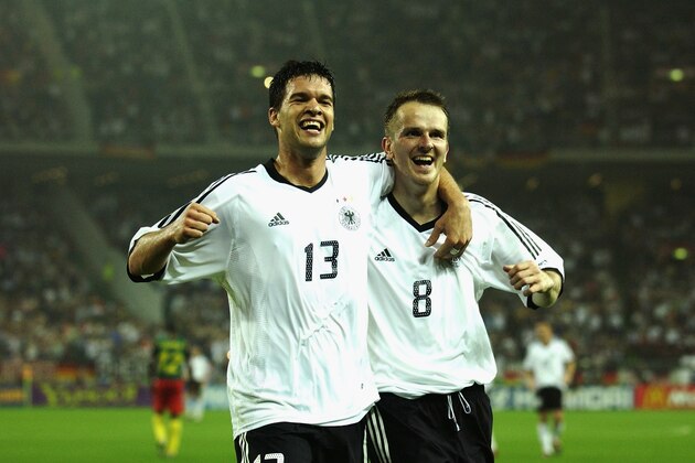 SHIZUOKA - JUNE 11:  Michael Ballack and Dietmar Hamann of Germany celebrate during the FIFA World Cup Finals 2002 Group E match between Germany and Cameroon played at the Shizuoka Stadium Ecopa, in Shizuoka, Japan on June 11, 2002. Germany won the match 2-0. DIGITAL IMAGE. (Photo by Stu Forster/Getty Images)