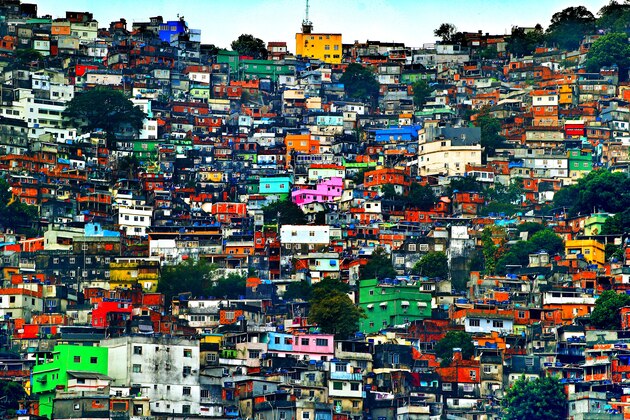 RIO DE JANEIRO, BRAZIL - JUNE 09:  (EDITORS NOTE: THIS IMAGE HAS BEEN CREATED WITH THE USE OF DIGITIAL FILTERS) A general view of the Rocinha favela as the England team visit Complexo Esportivo da Rocinha on June 9, 2014 in Rio de Janeiro, Brazil. (Photo by Richard Heathcote/Getty Images)