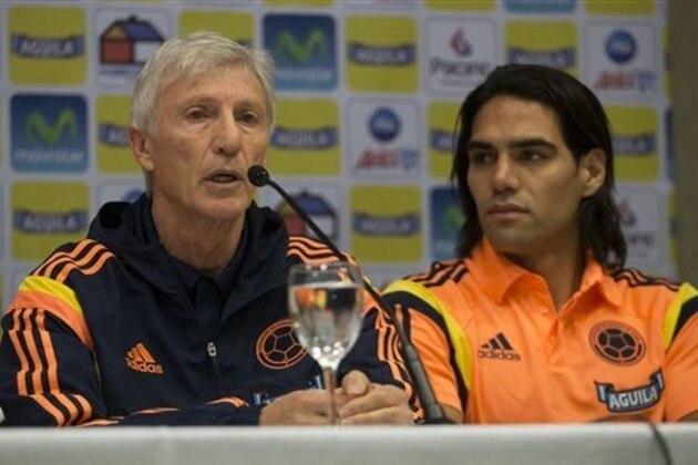 Colombia's national soccer team coach Jose Pekerman, left, announces the roster of players for the Brazil 2014 World Cup, with Colombian star Radamel Falcao Garcia sitting next to him, in Buenos Aires, Argentina, Monday, June 2, 2014. Falcao will not play in this World Cup as Pekerman did not include him in the final team roster. (AP Photo/Eduardo Di Baia) Colombia's national soccer team coach Jose Pekerman, left, announces the roster of players for the Brazil 2014 World Cup, with Colombian star Radamel Falcao Garcia sitting next to him, in Buenos Aires, Argentina, Monday, June 2, 2014. Falcao will not play in this World Cup as Pekerman did not include him in the final team roster. (AP Photo/Eduardo Di Baia)