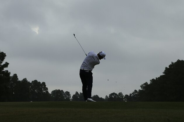 Lucas Bjerregaard, Denmark, hits his tee shot on the 12th hole during the first  round of the U.S. Open golf tournament in Pinehurst, N.C., Thursday, June 12, 2014. (AP Photo/Charlie Riedel)