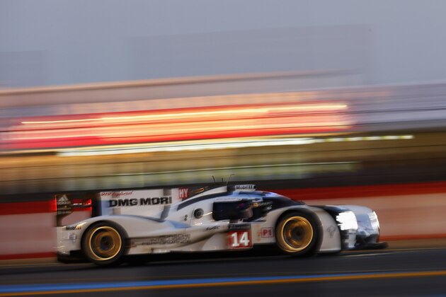 LE MANS, FRANCE - JUNE 11: Porsche Team, Porsche 919 Hybrid, Romain Dumas, Neel Jani, Marc Lieb during qualifying on June 11, 2014 in Le Mans, France.  (Photo by Andrew Hone/Getty Images)