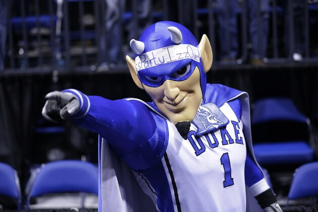 The Duke Blue Devils mascot is seen during the first half of a regional semifinal against Michigan State in the NCAA college basketball tournament, Friday, March 29, 2013, in Indianapolis. (AP Photo/Michael Conroy)