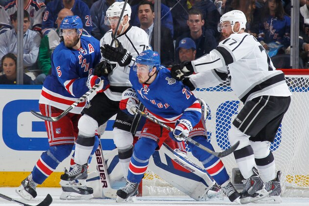 NEW YORK, NY - JUNE 11:  Ryan McDonagh #27 and Dan Girardi #5 of the New York Rangers battle for position in front of the net against Jeff Carter #77 and Tanner Pearson #70 of the Los Angeles Kings during Game Four of the 2014 NHL Stanley Cup Final at Madison Square Garden on June 11, 2014 in New York City. (Photo by Scott Levy/NHLI via Getty Images)