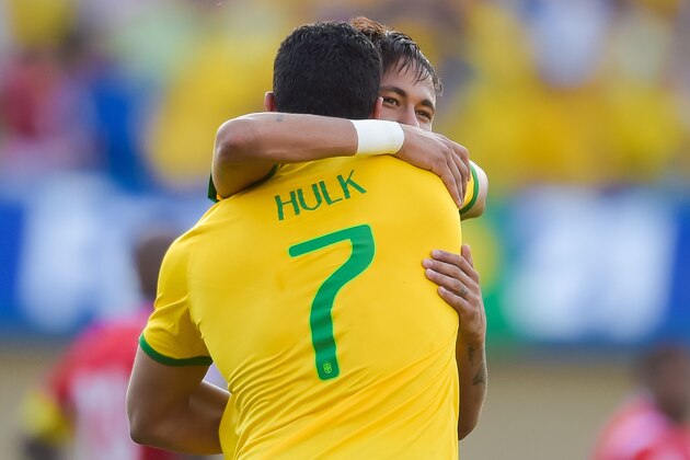 GOIANIA, BRAZIL - JUNE 03: Hulk of Brazil celebrates with team mate Neymar after scoring a goal during the International Friendly Match between Brazil and Panama at Serra Dourada Stadium on June 03, 2014 in Goiania, Brazil. (Photo by Buda Mendes/Getty Images)