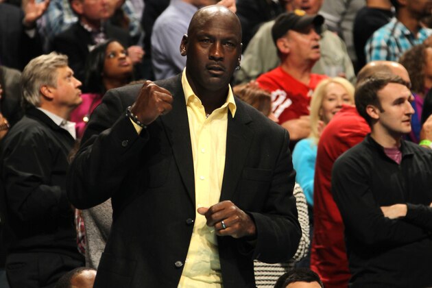 CHARLOTTE, NC - APRIL 16:  Michael Jordan, Owner of the Charlotte Bobcats gets happy during the game against the Chicago Bulls at the Time Warner Cable Arena on April 16, 2014 in Charlotte, North Carolina. NOTE TO USER: User expressly acknowledges and agrees that, by downloading and or using this photograph, User is consenting to the terms and conditions of the Getty Images License Agreement.  Mandatory Copyright Notice:  Copyright 2014 NBAE (Photo by Kent Smith/NBAE via Getty Images)