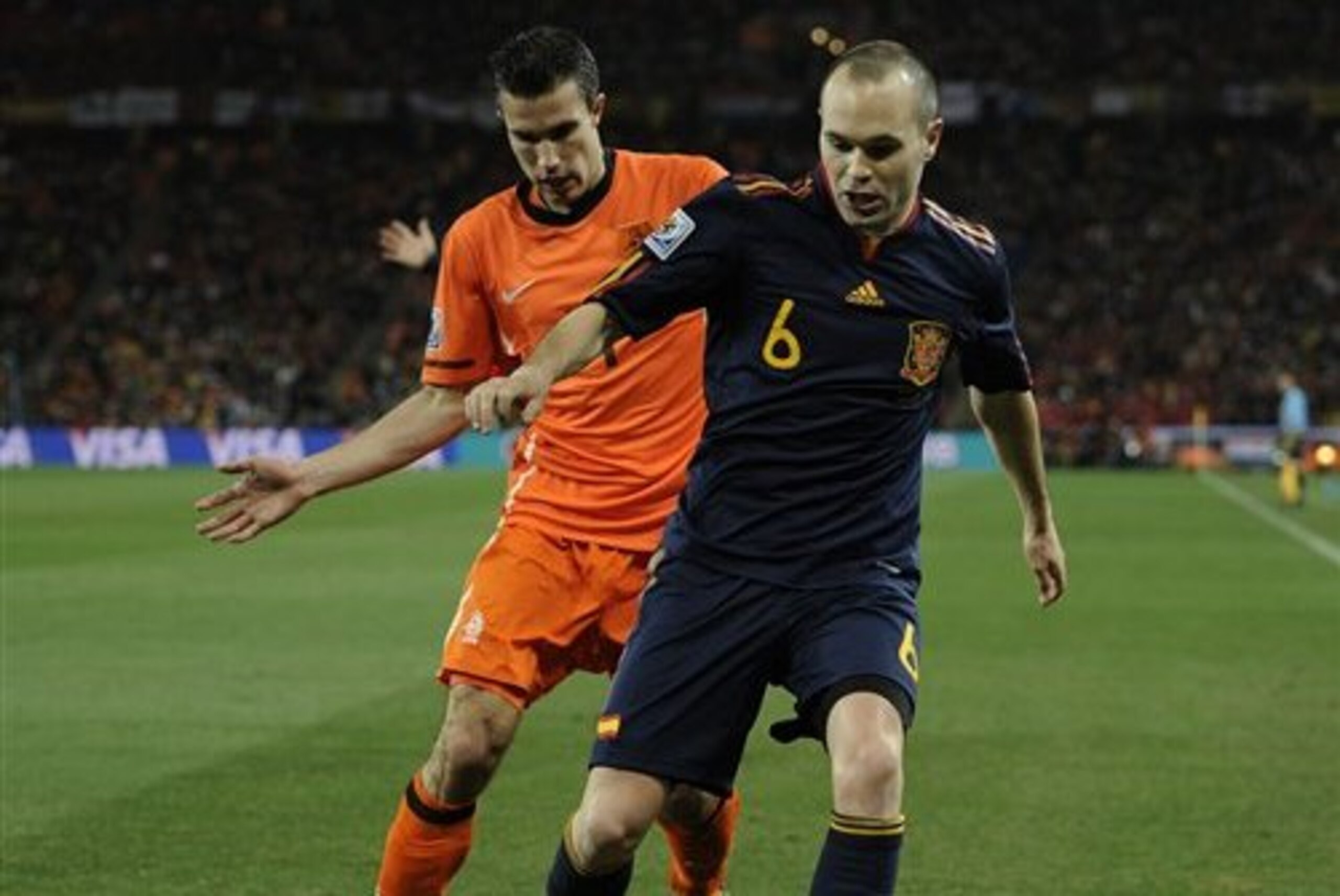 Spain's Andres Iniesta, right, and Netherlands' Robin van Persie, left during the World Cup final soccer match between the Netherlands and Spain at Soccer City in Johannesburg, South Africa, Sunday, July 11, 2010. (AP Photo/Martin Meissner) Spain's Andres Iniesta, right, and Netherlands' Robin van Persie, left during the World Cup final soccer match between the Netherlands and Spain at Soccer City in Johannesburg, South Africa, Sunday, July 11, 2010. (AP Photo/Martin Meissner)