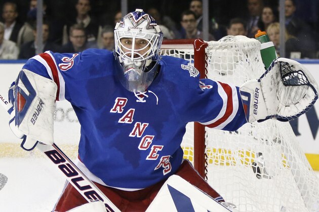 New York Rangers goalie Henrik Lundqvist (30) looks for the rebound after a shot by the Los Angeles Kings in the first period during Game 4 of the NHL hockey Stanley Cup Final, Wednesday, June 11, 2014, in New York. (AP Photo/Kathy Willens)