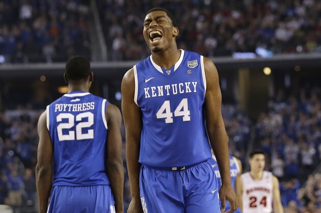 Kentucky center Dakari Johnson (44) celebrates during the second half of an NCAA Final Four tournament college basketball semifinal game against Wisconsin Saturday, April 5, 2014, in Arlington, Texas. (AP Photo/Eric Gay)