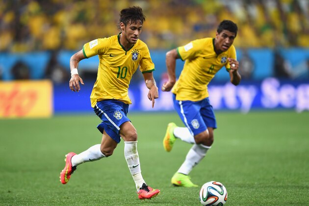 SAO PAULO, BRAZIL - JUNE 12: Neymar of Brazil controls the ball in the first half during the 2014 FIFA World Cup Brazil Group A match between Brazil and Croatia at Arena de Sao Paulo on June 12, 2014 in Sao Paulo, Brazil.  (Photo by Buda Mendes/Getty Images)