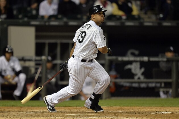 CHICAGO, IL - JUNE 11:  Jose Abreu #79 of the Chicago White Sox singles during the eighth inning against the Detroit Tigers at U.S. Cellular Field June 11, 2014 in Chicago, Illinois. The White Sox defeated the Tigers 8-2. (Photo by Brian Kersey/Getty Images)