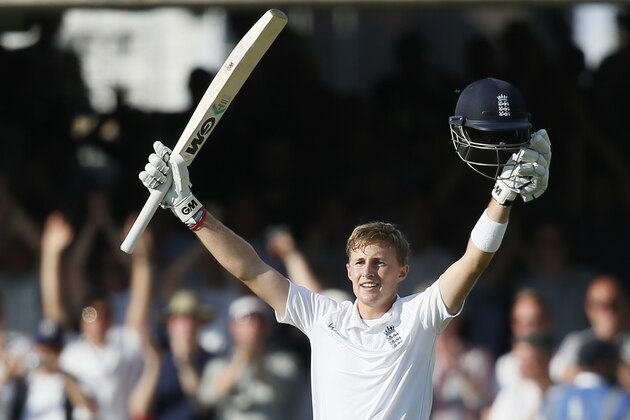 England's Joe Root celebrates getting 100 runs not out on the first day of the first test cricket match between England and Sri Lanka at Lord's cricket ground in London, Thursday, June, 12, 2014. (AP Photo/Alastair Grant)