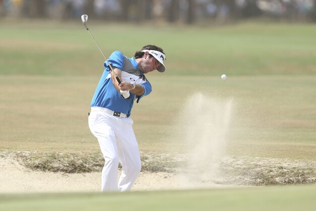 Jun 12, 2014; Pinehurst, NC, USA; Bubba Watson hits a shot on the 10th hole during the first round of the 2014 U.S. Open golf tournament at Pinehurst Resort Country Club - #2 Course. Mandatory Credit: Jason Getz-USA TODAY Sports