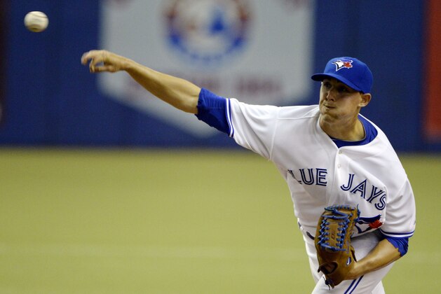 Mar 29, 2014; Montreal, Quebec, CAN; Toronto Blue Jays pitcher Aaron Sanchez (41) pitches in the ninth inning against the New York Mets at Olympic Stadium. Mandatory Credit: Eric Bolte-USA TODAY Sports