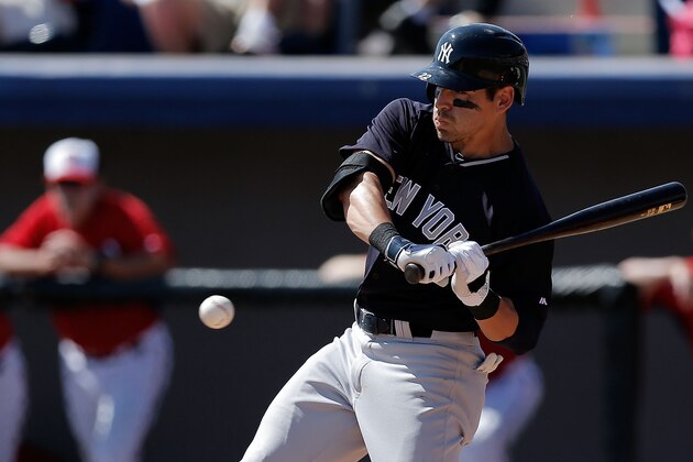 VIERA, FL - MARCH 11:  Jacob Ellsbury #22 of the New York Yankees takes a pitch against the Washington Nationals in the sixth inning of a game at the Space Coast Stadium on March 11, 2014 in Viera, Florida.  (Photo by Stacy Revere/Getty Images)
