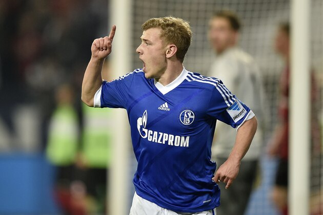 Schalke's Max Meyer celebrates scoring during the German Bundesliga soccer match between FC Schalke 04 and Eintracht Frankfurt in Gelsenkirchen, Germany, Friday April 11, 2014. (AP Photo/Martin Meissner)