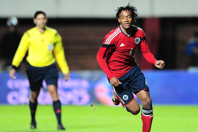 BUENOS AIRES, ARGENTINA - JUNE 06: Juan Cuadrado of Colombia celebrates after shooting a penalty kick to score the second goal during the International Friendly Match between Colombia and Jordan at Pedro Bidegain Stadium on June 06, 2014 in Buenos Aires, Argentina. (Photo by Alfredo Herms/Getty Images)