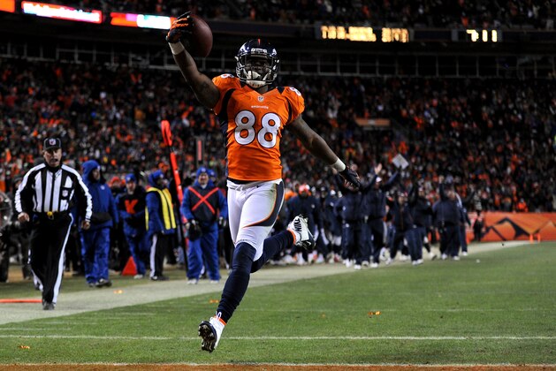 DENVER, CO - JANUARY 12:  Demaryius Thomas #88 of the Denver Broncos scores a 17-yard touchdown reception in the fourth quarter against the Baltimore Ravens during the AFC Divisional Playoff Game at Sports Authority Field at Mile High on January 12, 2013 in Denver, Colorado.  (Photo by Dustin Bradford/Getty Images)