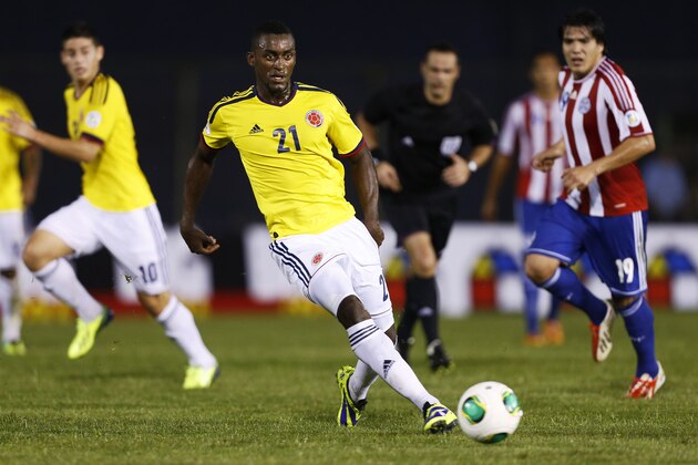 Colombia's Jackson Martinez kicks the ball during a 2014 World Cup qualifying soccer match against Paraguay  in Asuncion, Paraguay,  Tuesday, Oct. 15, 2013. (AP Photo/Victor R. Caivano)