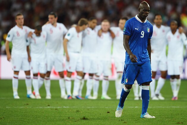KIEV, UKRAINE - JUNE 24:  Mario Balotelli of Italy walks towards the penalty spot in the shootout during the UEFA EURO 2012 quarter final match between England and Italy at The Olympic Stadium on June 24, 2012 in Kiev, Ukraine.  (Photo by Laurence Griffiths/Getty Images)
