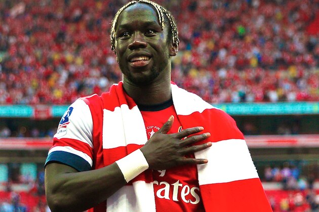 LONDON, ENGLAND - MAY 17:  Bacary Sagna of Arsenal celebrates victory after the FA Cup with Budweiser Final match between Arsenal and Hull City at Wembley Stadium on May 17, 2014 in London, England.  (Photo by Paul Gilham/Getty Images)