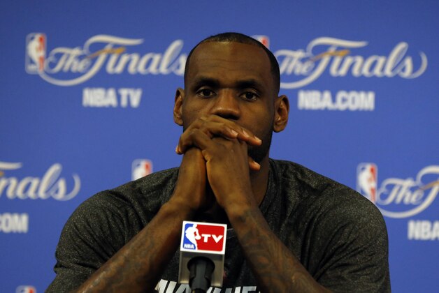 Jun 12, 2014; Miami, FL, USA; Miami Heat forward LeBron James speaks to the media after game four of the 2014 NBA Finals against the San Antonio Spurs at American Airlines Arena. Mandatory Credit: Robert Mayer-USA TODAY Sports