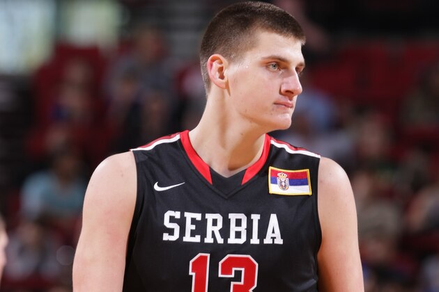 PORTLAND, OR - APRIL 12:  Nikola Jokic #13 of the World Team walks up court against the USA Team on April 12, 2014 at the Moda Center Arena in Portland, Oregon. NOTE TO USER: User expressly acknowledges and agrees that, by downloading and or using this photograph, user is consenting to the terms and conditions of the Getty Images License Agreement. Mandatory Copyright Notice: Copyright 2014 NBAE (Photo by Sam Forencich/NBAE via Getty Images)