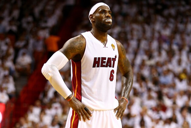 MIAMI, FL - JUNE 12:  LeBron James #6 of the Miami Heat looks on against the San Antonio Spurs during Game Four of the 2014 NBA Finals at American Airlines Arena on June 12, 2014 in Miami, Florida. NOTE TO USER: User expressly acknowledges and agrees that, by downloading and or using this photograph, User is consenting to the terms and conditions of the Getty Images License Agreement.  (Photo by Andy Lyons/Getty Images)