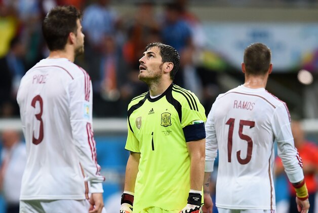 SALVADOR, BRAZIL - JUNE 13: Iker Casillas of Spain reacts after allowing the third goal during the 2014 FIFA World Cup Brazil Group B match between Spain and Netherlands at Arena Fonte Nova on June 13, 2014 in Salvador, Brazil. (Photo by David Ramos/Getty Images) SALVADOR, BRAZIL - JUNE 13: Iker Casillas of Spain reacts after allowing the third goal during the 2014 FIFA World Cup Brazil Group B match between Spain and Netherlands at Arena Fonte Nova on June 13, 2014 in Salvador, Brazil. (Photo by David Ramos/Getty Images)