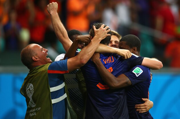 SALVADOR, BRAZIL - JUNE 13:  Stefan de Vrij of the Netherlands celebrate the third goal with his team-mates during the 2014 FIFA World Cup Brazil Group B match between Spain and Netherlands at Arena Fonte Nova on June 13, 2014 in Salvador, Brazil.  (Photo by Paul Gilham/Getty Images)
