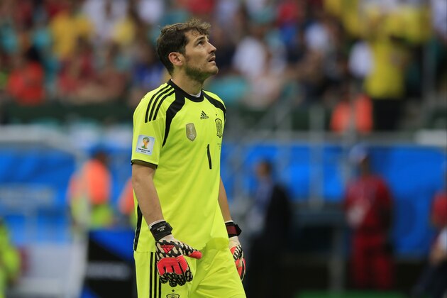 Spain's goalkeeper Iker Casillas reacts during the group B World Cup soccer match between Spain and the Netherlands at the Arena Ponte Nova in Salvador, Brazil, Friday, June 13, 2014. (AP Photo/Bernat Armangue)