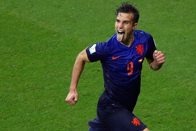 SALVADOR, BRAZIL - JUNE 13:  Robin van Persie of the Netherlands celebrates after scoring his second goal and his teams fourth during the 2014 FIFA World Cup Brazil Group B match between Spain and Netherlands at Arena Fonte Nova on June 13, 2014 in Salvador, Brazil.  (Photo by Jeff Gross/Getty Images)