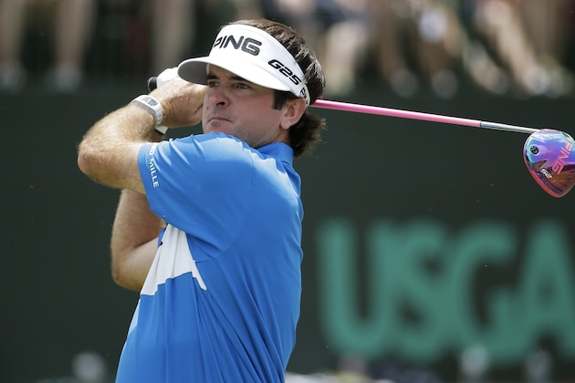 Bubba Watson watches his tee shot on the fourth hole during the first round of the U.S. Open golf tournament in Pinehurst, N.C., Thursday, June 12, 2014. (AP Photo/Eric Gay)