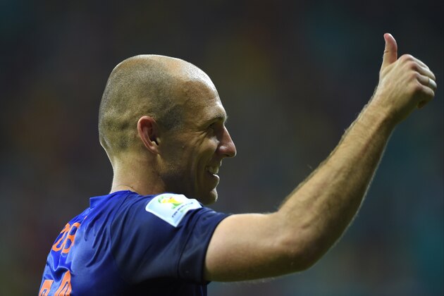 Netherlands' Arjen Robben gives a thumbs up after the group B World Cup soccer match between Spain and the Netherlands at the Arena Ponte Nova in Salvador, Brazil, Friday, June 13, 2014. (AP Photo/Manu Fernandez)