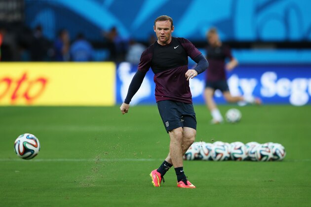 MANAUS, BRAZIL - JUNE 13:  Wayne Rooney in action during the England training session ahead of their first match of the 2014 FIFA World Cup Brazil against Italy at Arena Amazonia on June 13, 2014 in Manaus, Brazil.  (Photo by Richard Heathcote/Getty Images)