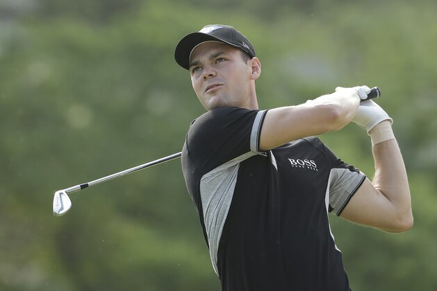 Martin Kaymer, of Germany, watches his tee shot  on the 15th tee during the second round of the U.S. Open golf tournament in Pinehurst, N.C., Friday, June 13, 2014. (AP Photo/Chuck Burton)