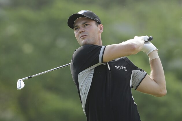 Martin Kaymer, of Germany, watches his tee shot  on the 15th tee during the second round of the U.S. Open golf tournament in Pinehurst, N.C., Friday, June 13, 2014. (AP Photo/Chuck Burton)