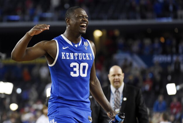 Apr 5, 2014; Arlington, TX, USA; Kentucky Wildcats forward Julius Randle (30) celebrates after defeating the Wisconsin Badgers in the semifinals of the Final Four in the 2014 NCAA Mens Division I Championship tournament at AT&T Stadium. Mandatory Credit: Robert Deutsch-USA TODAY Sports