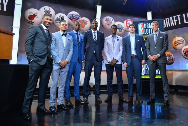 NEW YORK - MAY 20: NBA Draft Prospects Marcus Smart, Tyler Ennis, Andrew Wiggins, Joel Embiid, Noah Vonleh, Doug McDermott and Aaron Gordon poses for a photo during to the 2014 NBA Draft Lottery on May 20, 2014 at the ABC News' 'Good Morning America' Times Square Studio in New York City.  NOTE TO USER: User expressly acknowledges and agrees that, by downloading and/or using this photograph, user is consenting to the terms and conditions of the Getty Images License Agreement. Mandatory Copyright Notice: Copyright 2014 NBAE (Photo by Jesse D. Garrabrant/NBAE via Getty Images)