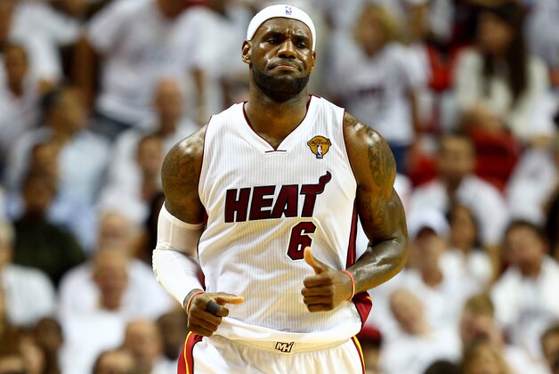 MIAMI, FL - JUNE 12:  LeBron James #6 of the Miami Heat reacts against the San Antonio Spurs during Game Four of the 2014 NBA Finals at American Airlines Arena on June 12, 2014 in Miami, Florida. NOTE TO USER: User expressly acknowledges and agrees that, by downloading and or using this photograph, User is consenting to the terms and conditions of the Getty Images License Agreement.  (Photo by Andy Lyons/Getty Images)