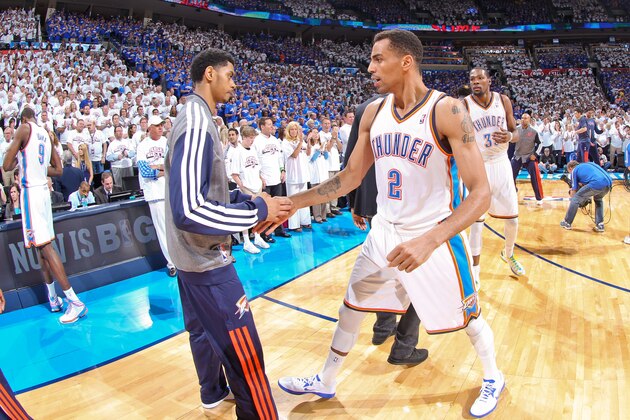 OKLAHOMA CITY, OK - MAY 7: Thabo Sefolosha #2 of the Oklahoma City Thunder greets teammate Jeremy Lamb #11 before playing the Memphis Grizzlies in Game Two of the Western Conference Semifinals during the 2013 NBA Playoffs on May 7, 2013 at the Chesapeake Energy Arena in Oklahoma City, Oklahoma. NOTE TO USER: User expressly acknowledges and agrees that, by downloading and or using this photograph, User is consenting to the terms and conditions of the Getty Images License Agreement. Mandatory Copyright Notice: Copyright 2013 NBAE (Photo by Layne Murdoch/NBAE via Getty Images)