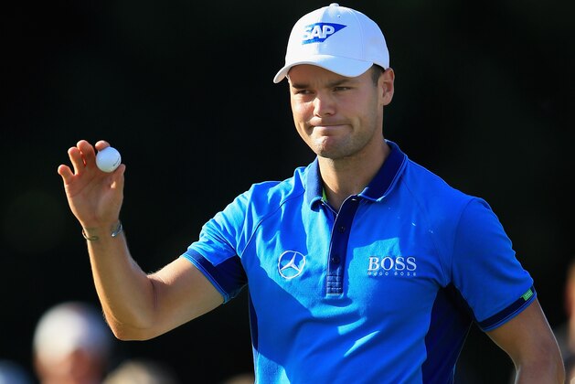 PINEHURST, NC - JUNE 12:  Martin Kaymer of Germany waves to the gallery on the 18th green after his fiver-under par 65 during the first round of the 114th U.S. Open at Pinehurst Resort & Country Club, Course No. 2 on June 12, 2014 in Pinehurst, North Carolina.  (Photo by David Cannon/Getty Images)